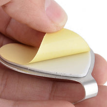 Set of 6 sticky wall hooks, strong adhesive, heavy-duty.